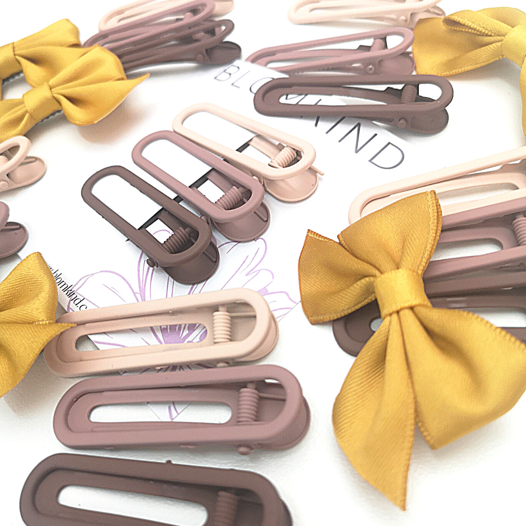 Gold Bow Hairclip Set of 4. Perfect for school.